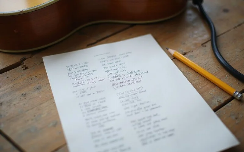 A half-finished lyric sheet with edits